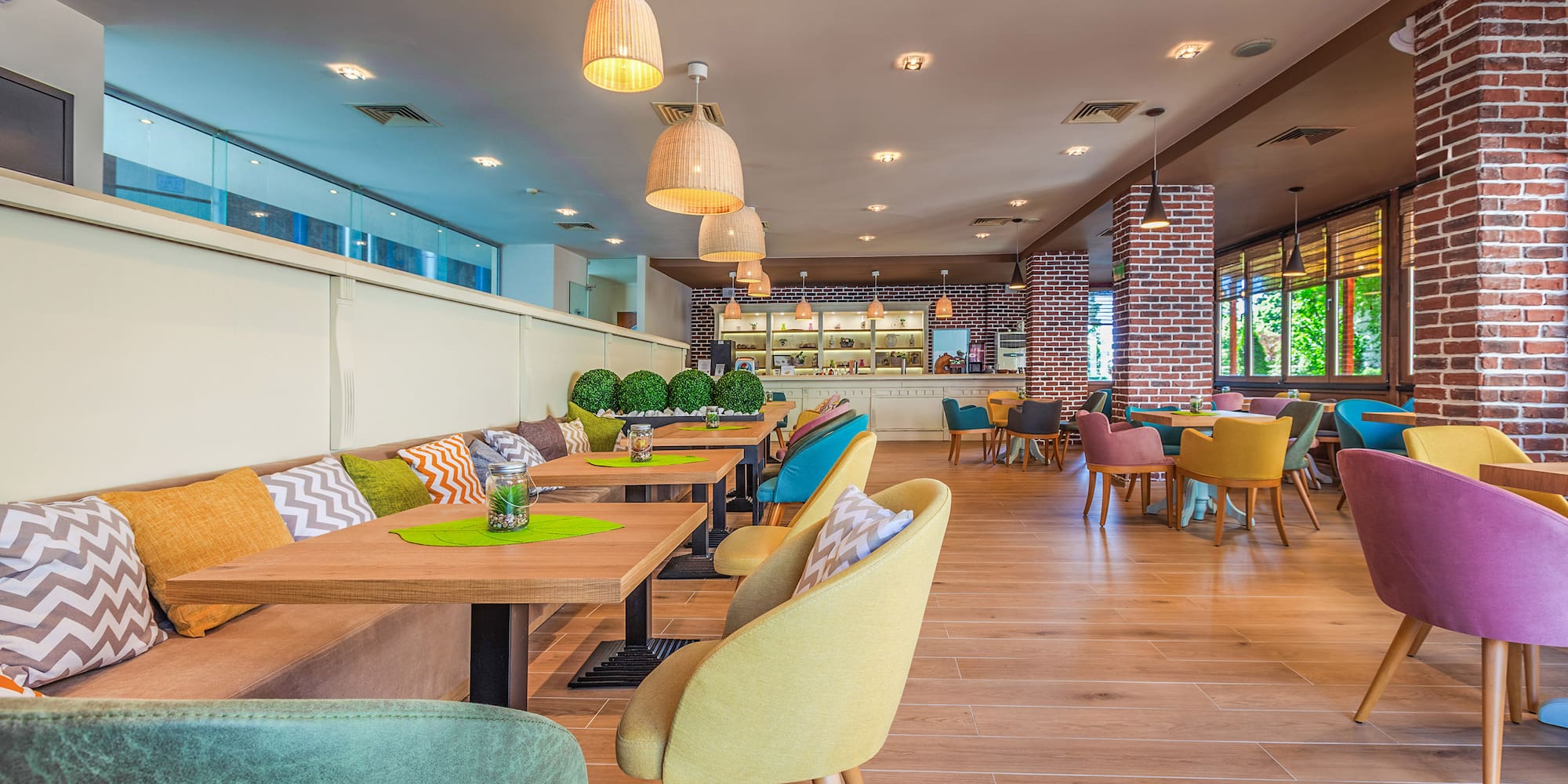 a restaurant with tables and chairs