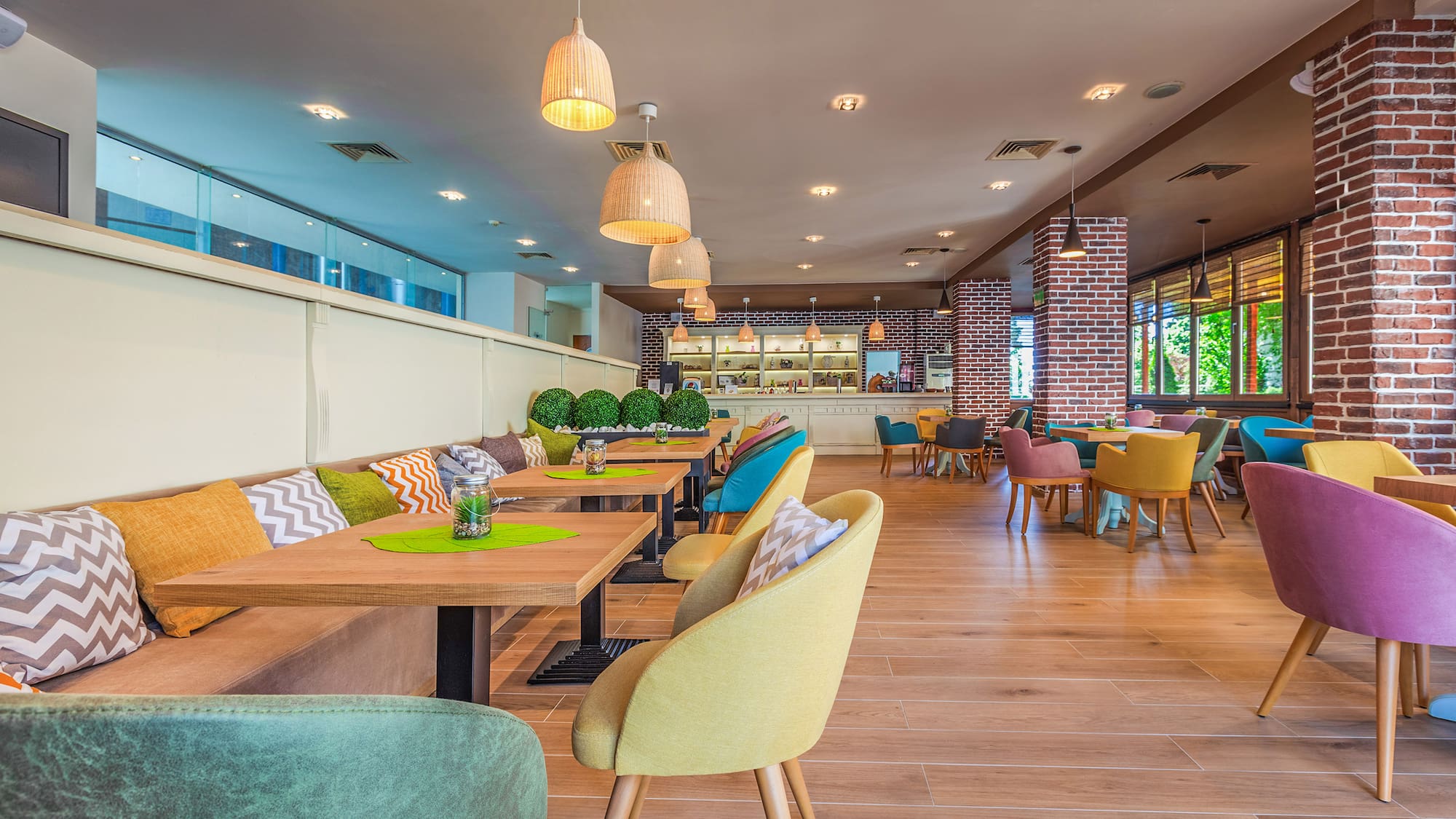 a restaurant with tables and chairs