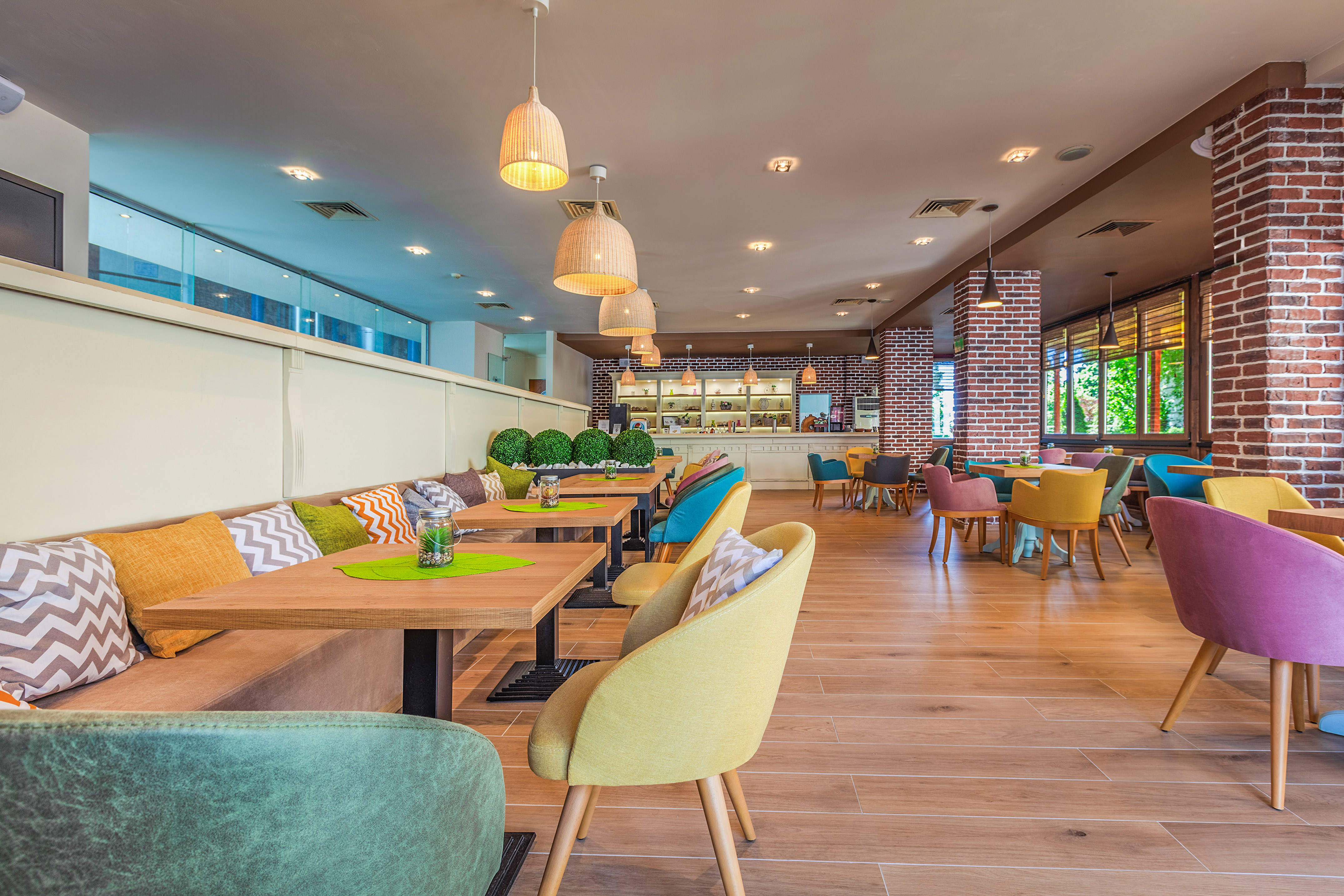 a restaurant with tables and chairs