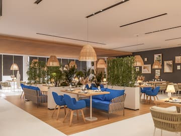 a restaurant with tables and chairs