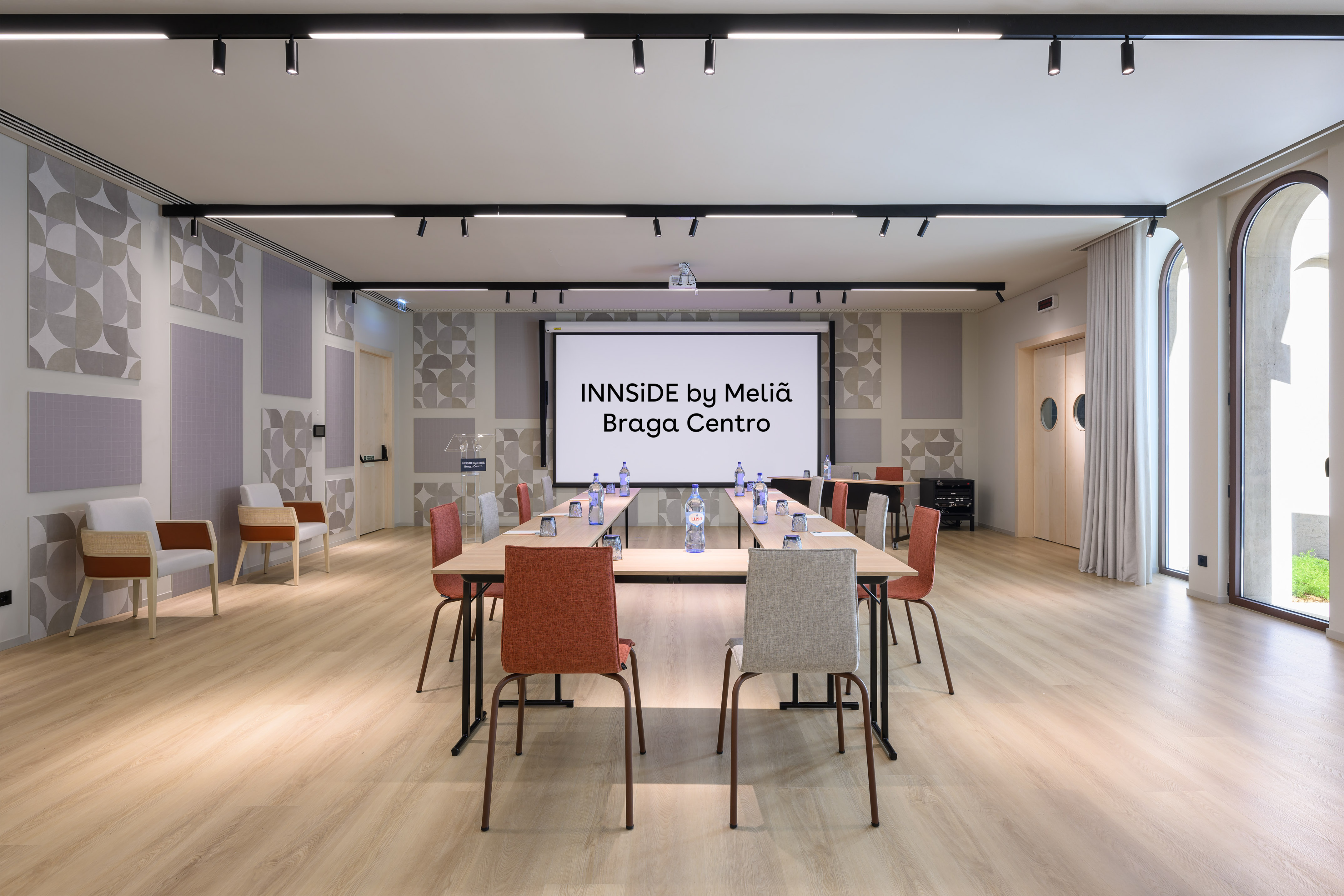 a room with a large table and chairs