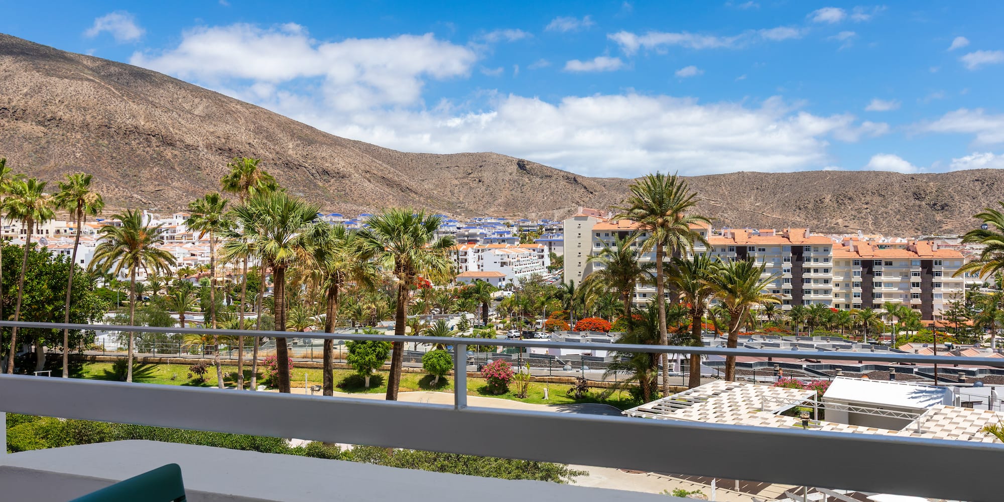 a balcony overlooking a city