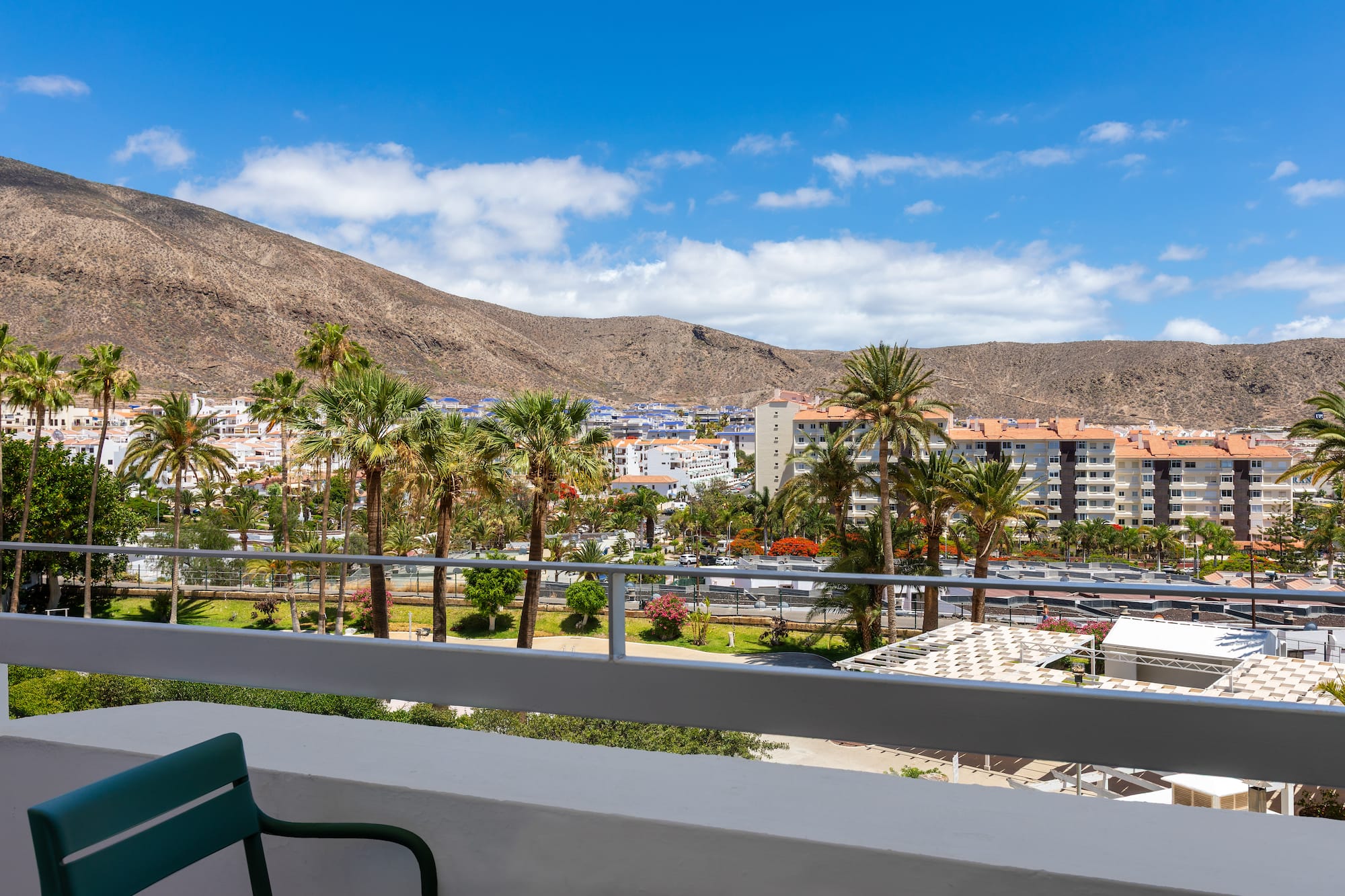 a balcony overlooking a city