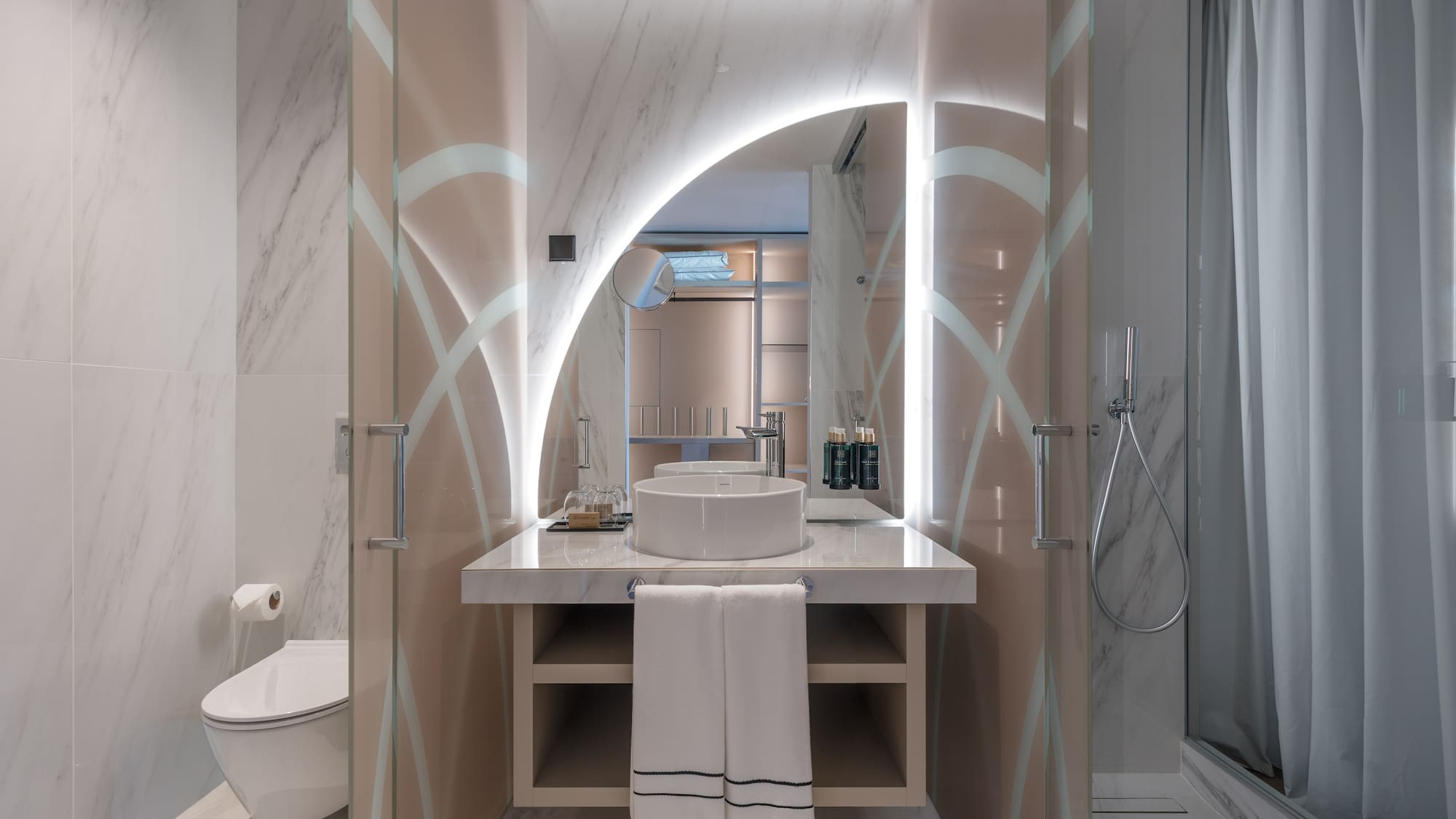 a bathroom with a sink and shower