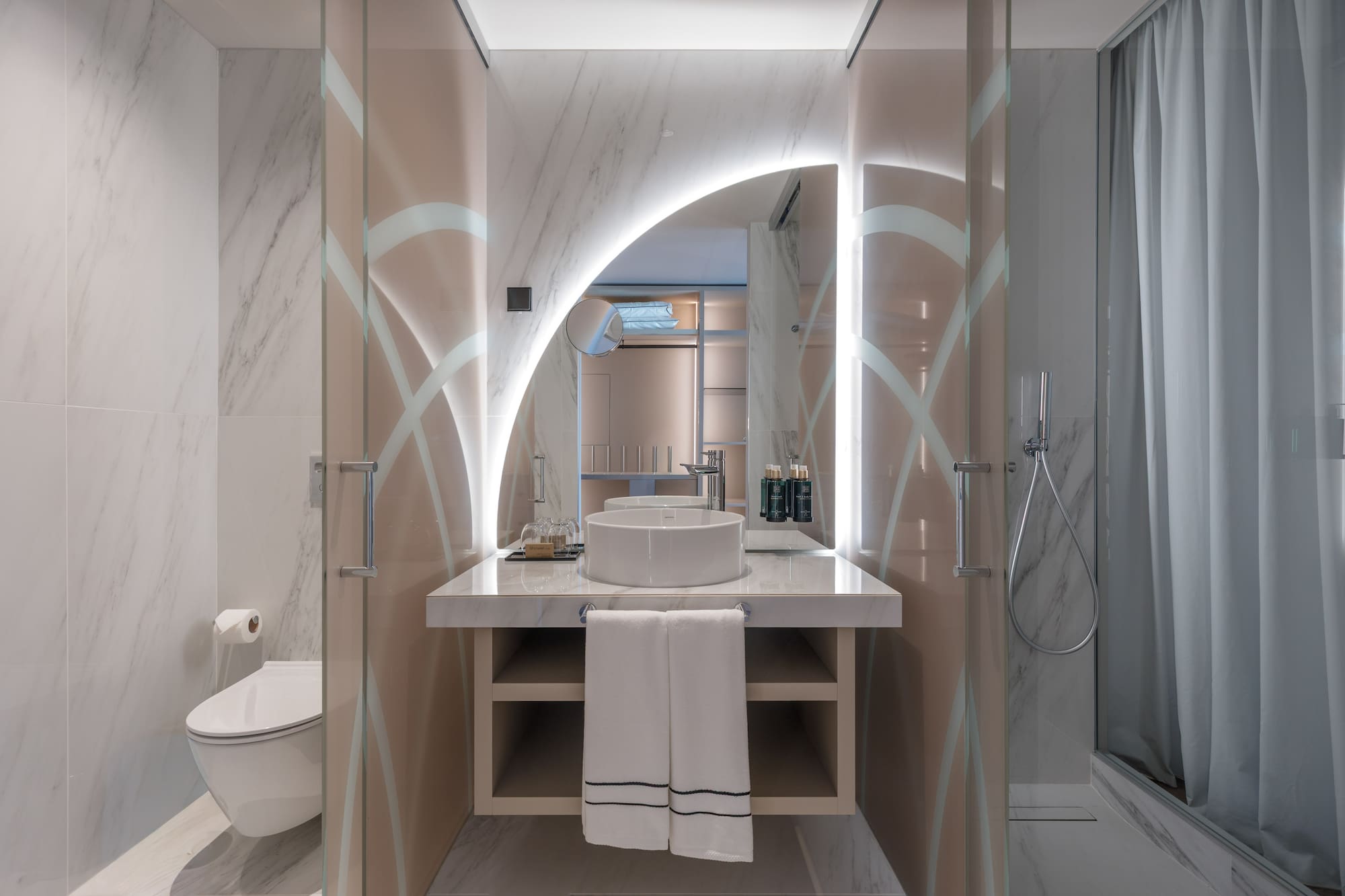 a bathroom with a sink and shower