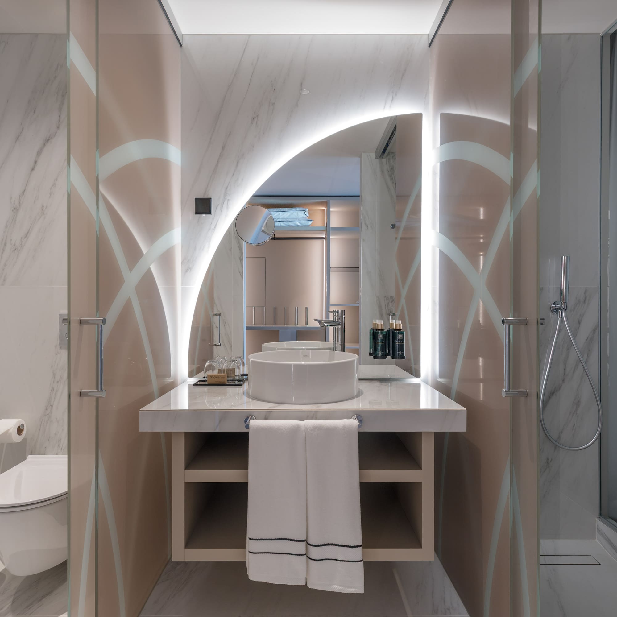 a bathroom with a sink and shower