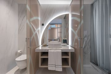 a bathroom with a sink and shower