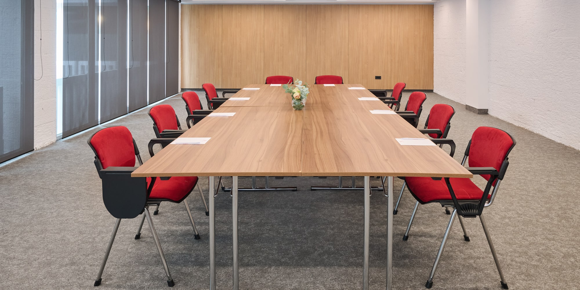 a room with a table and chairs