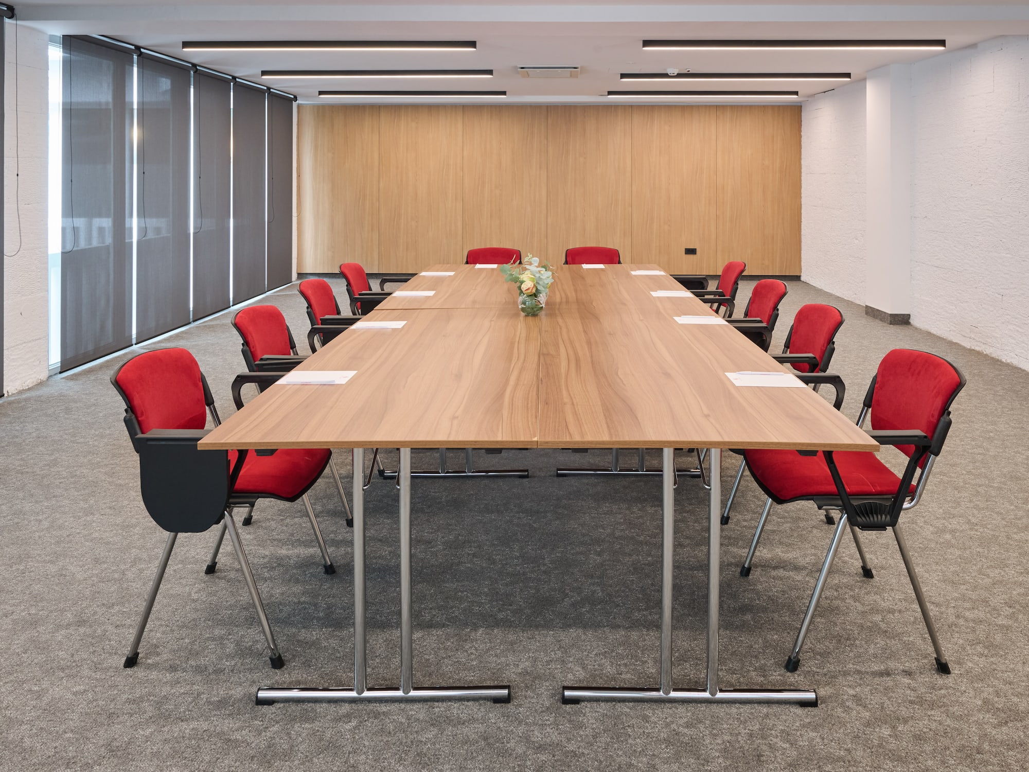 a room with a table and chairs