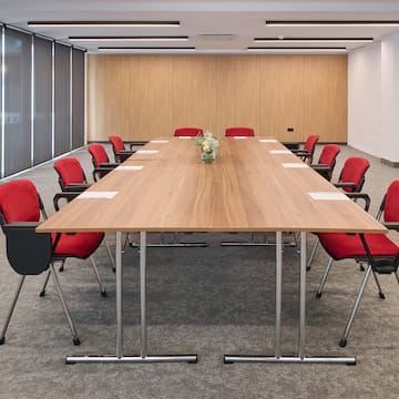 a room with a table and chairs