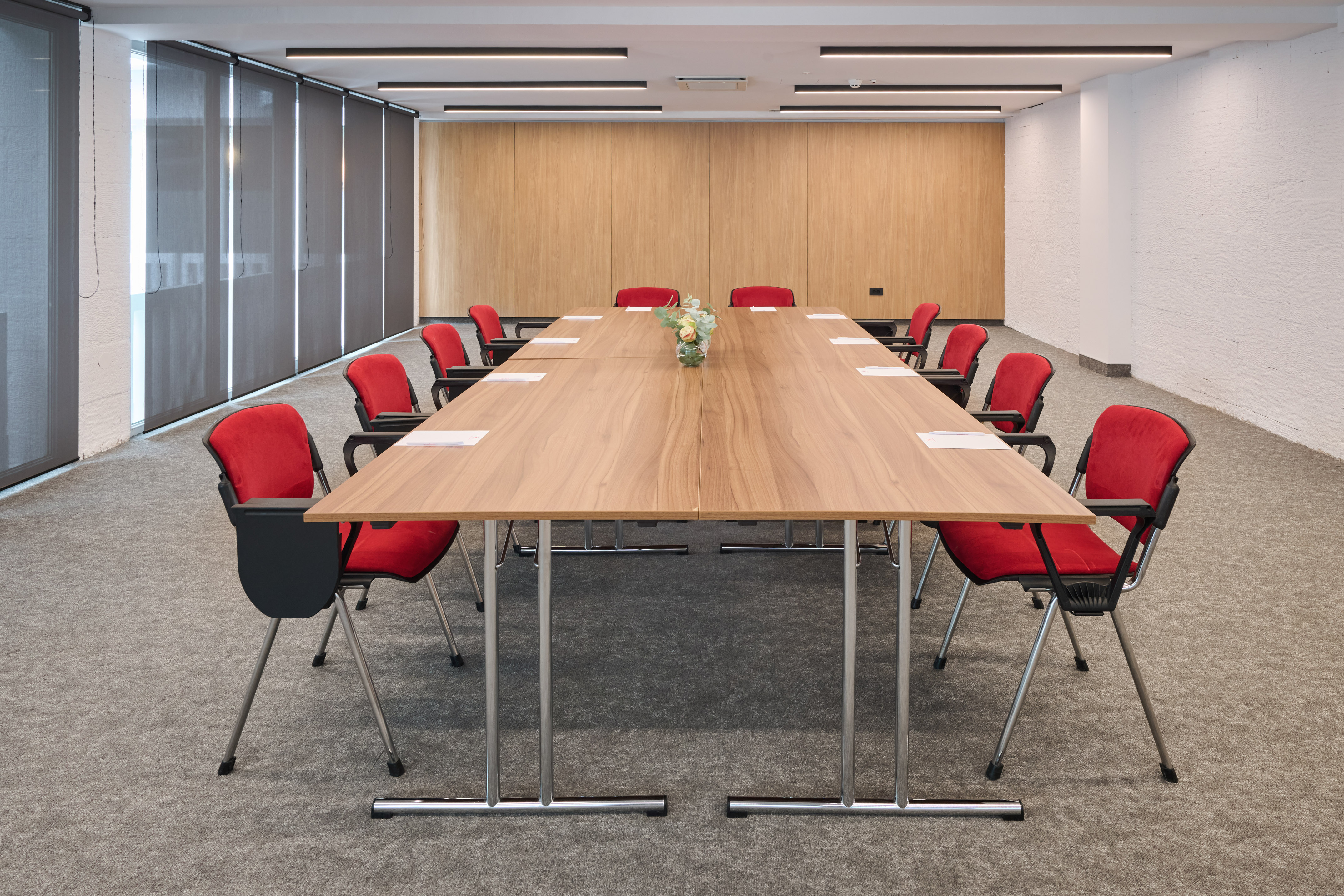 a room with a table and chairs