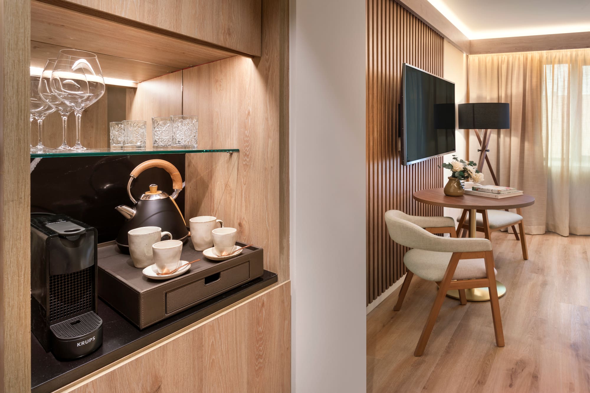 a room with a tv and a table