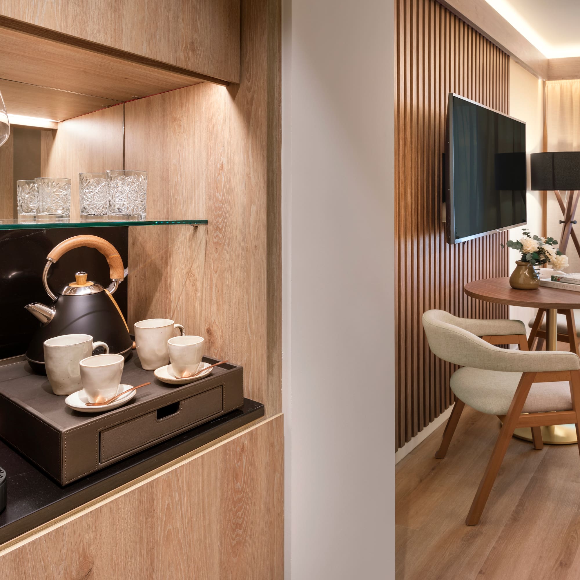 a room with a tv and a table