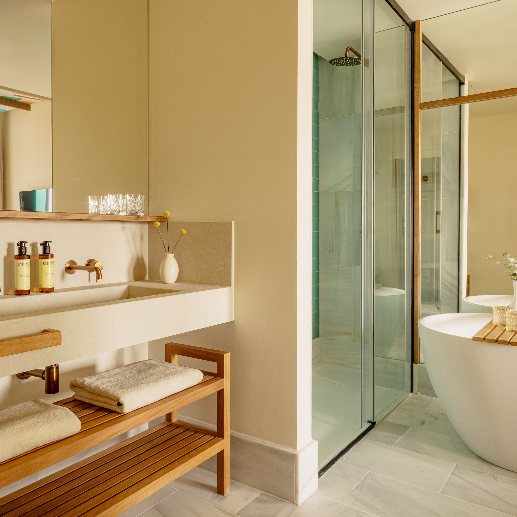 a bathroom with a tub and sink