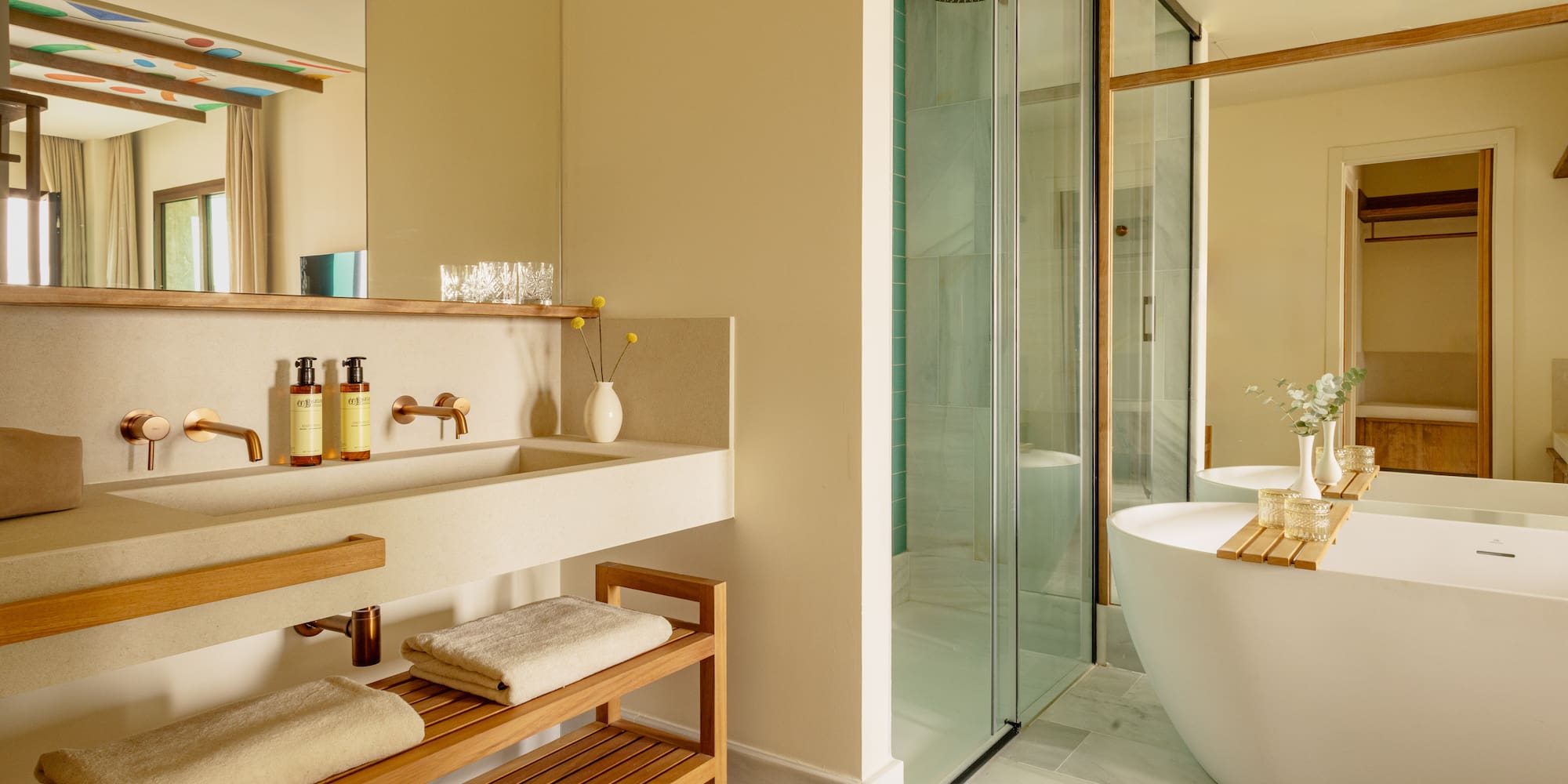 a bathroom with a tub and sink