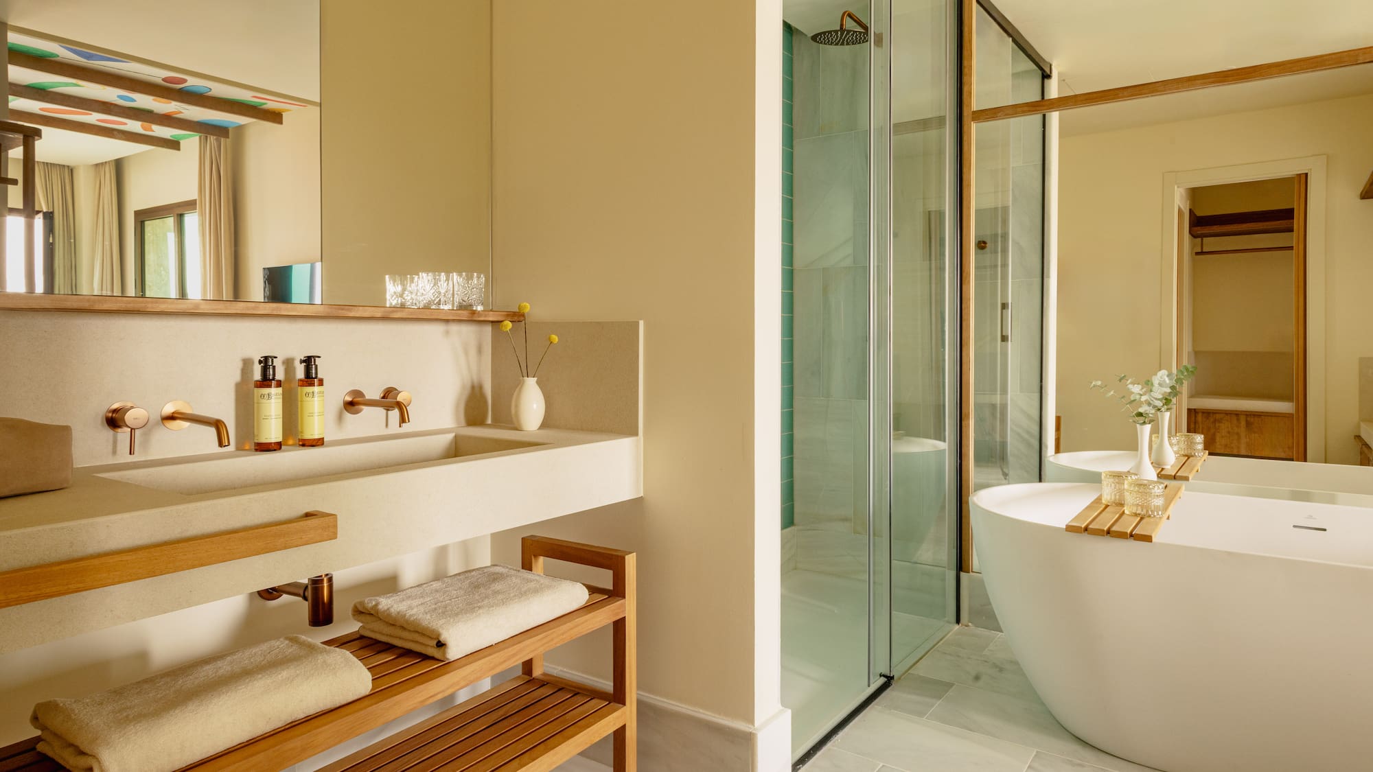 a bathroom with a tub and sink