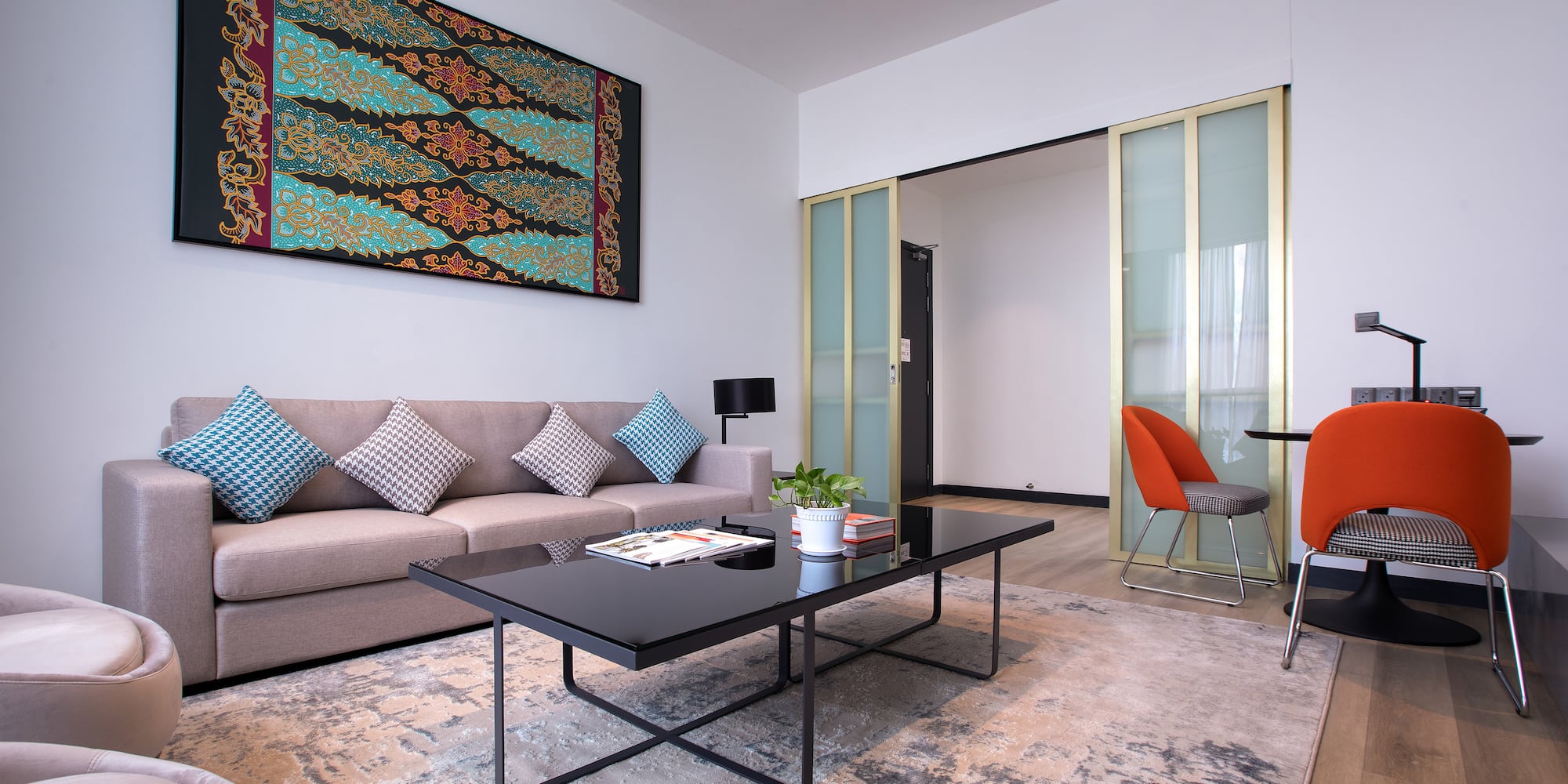 a living room with a couch and a table