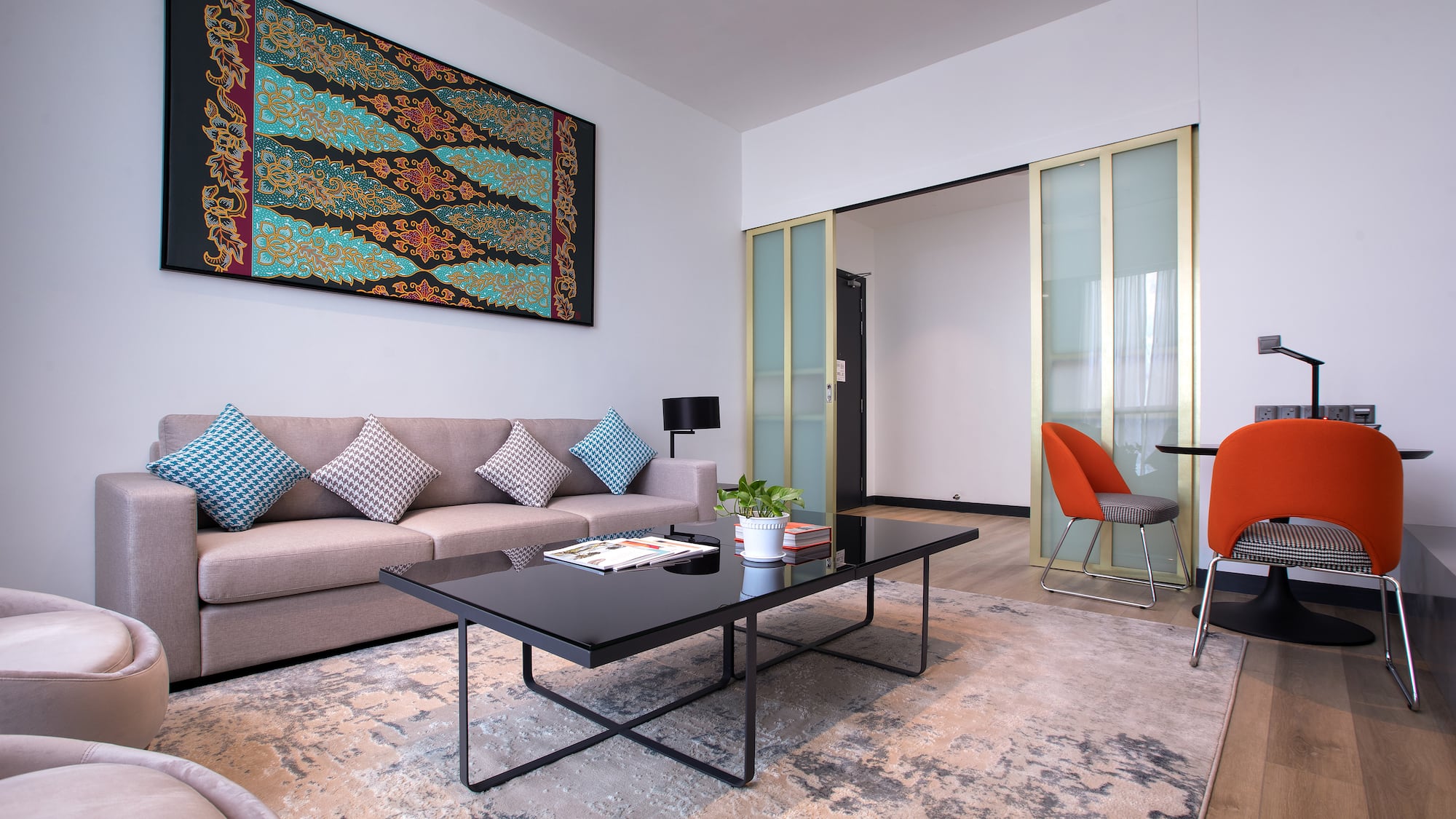 a living room with a couch and a table