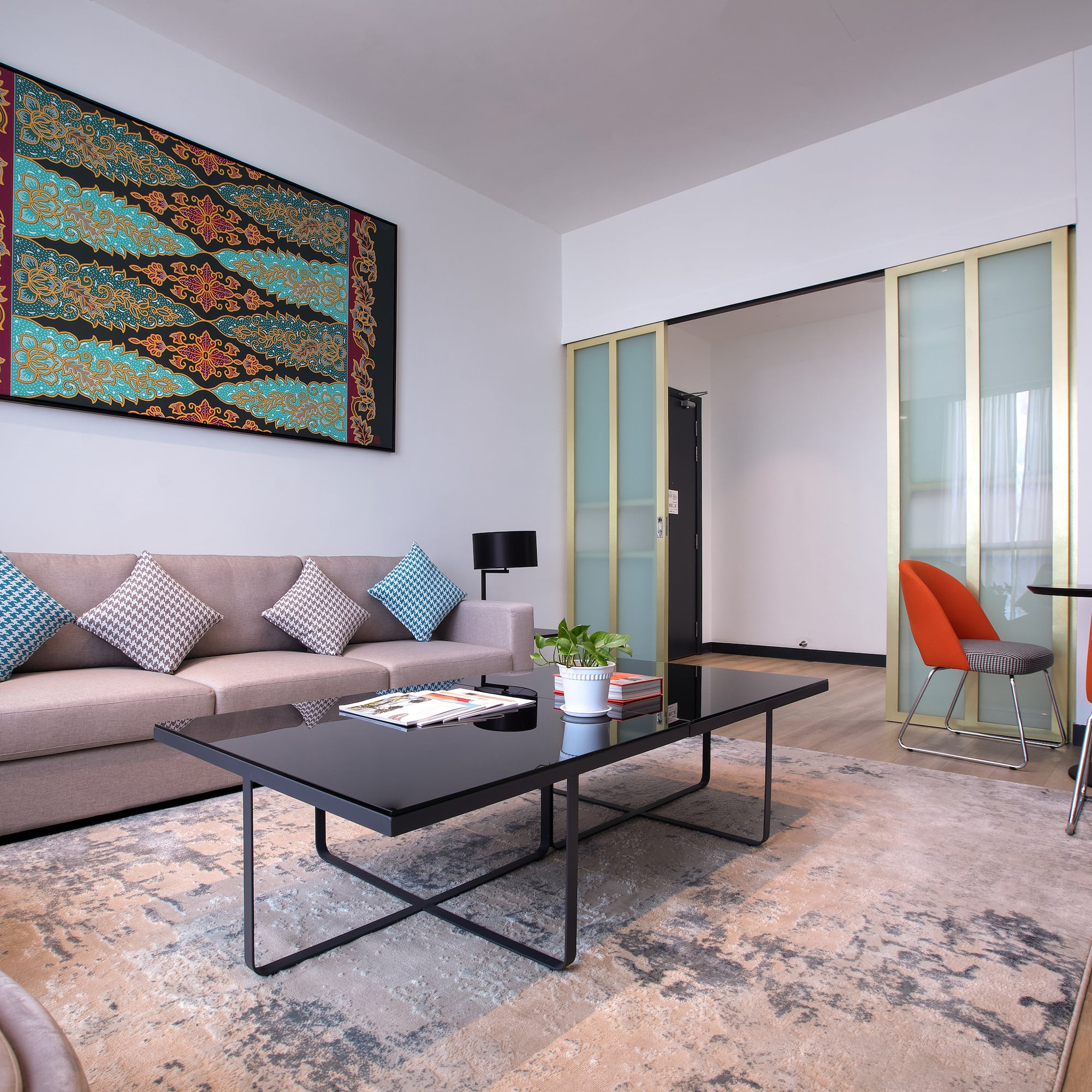 a living room with a couch and a table