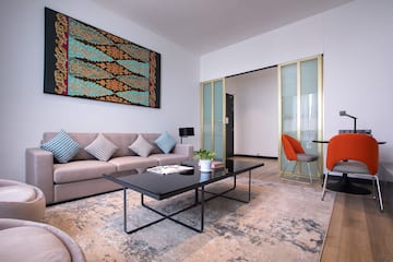 a living room with a couch and a table