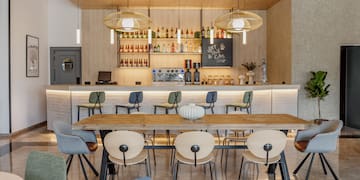 a room with a table and chairs