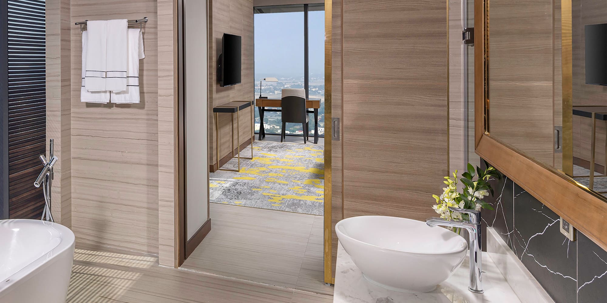 a bathroom with a tub and sink