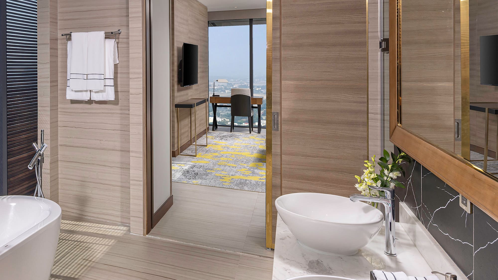 a bathroom with a tub and sink