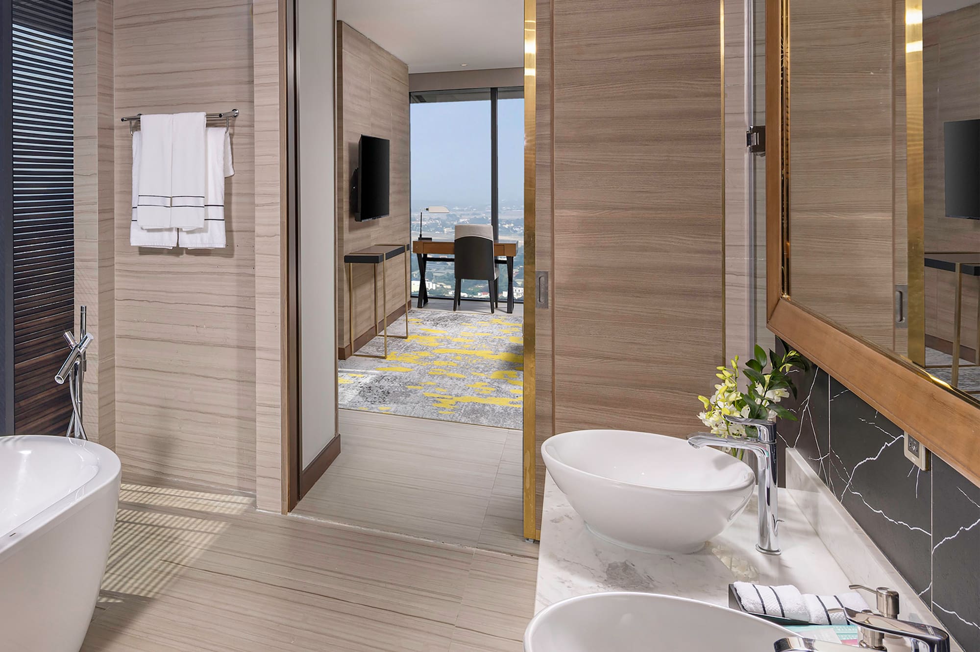 a bathroom with a tub and sink