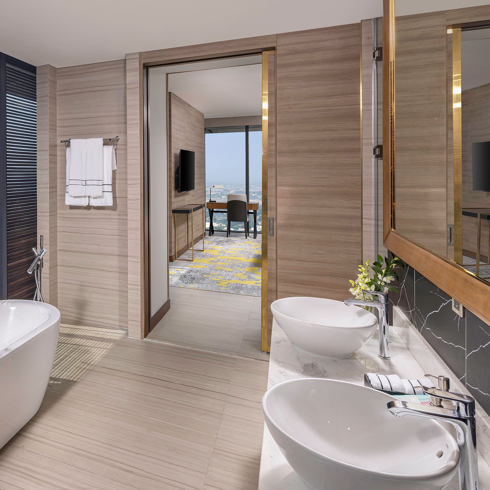 a bathroom with a tub and sink