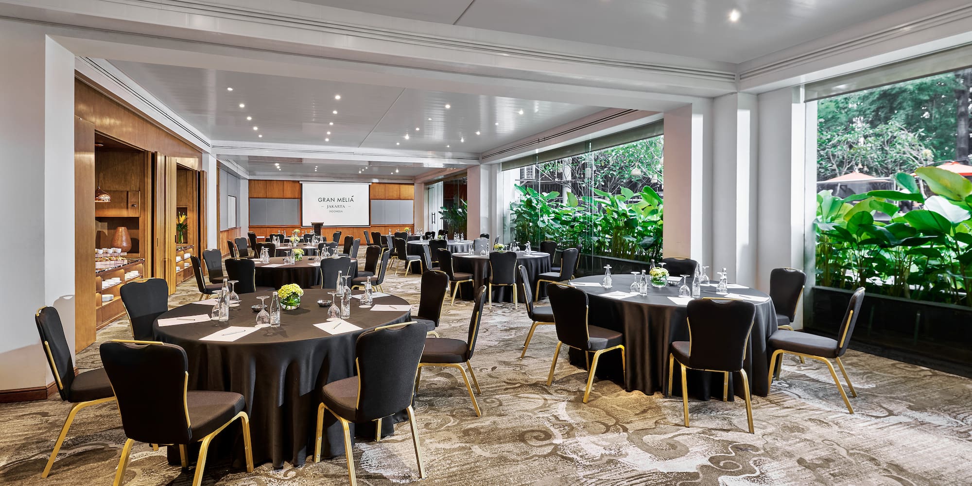 a room with tables and chairs