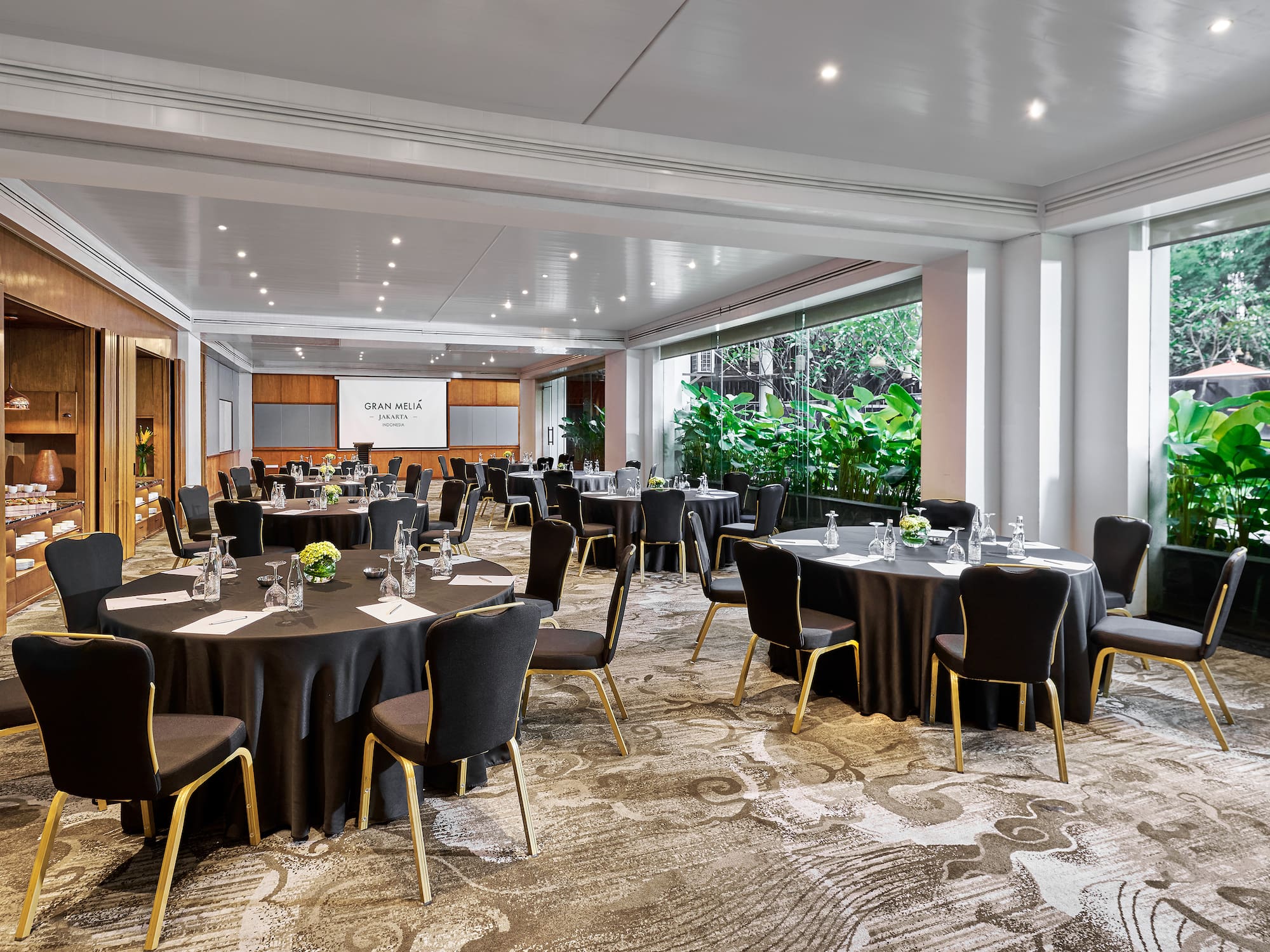 a room with tables and chairs