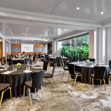 a room with tables and chairs