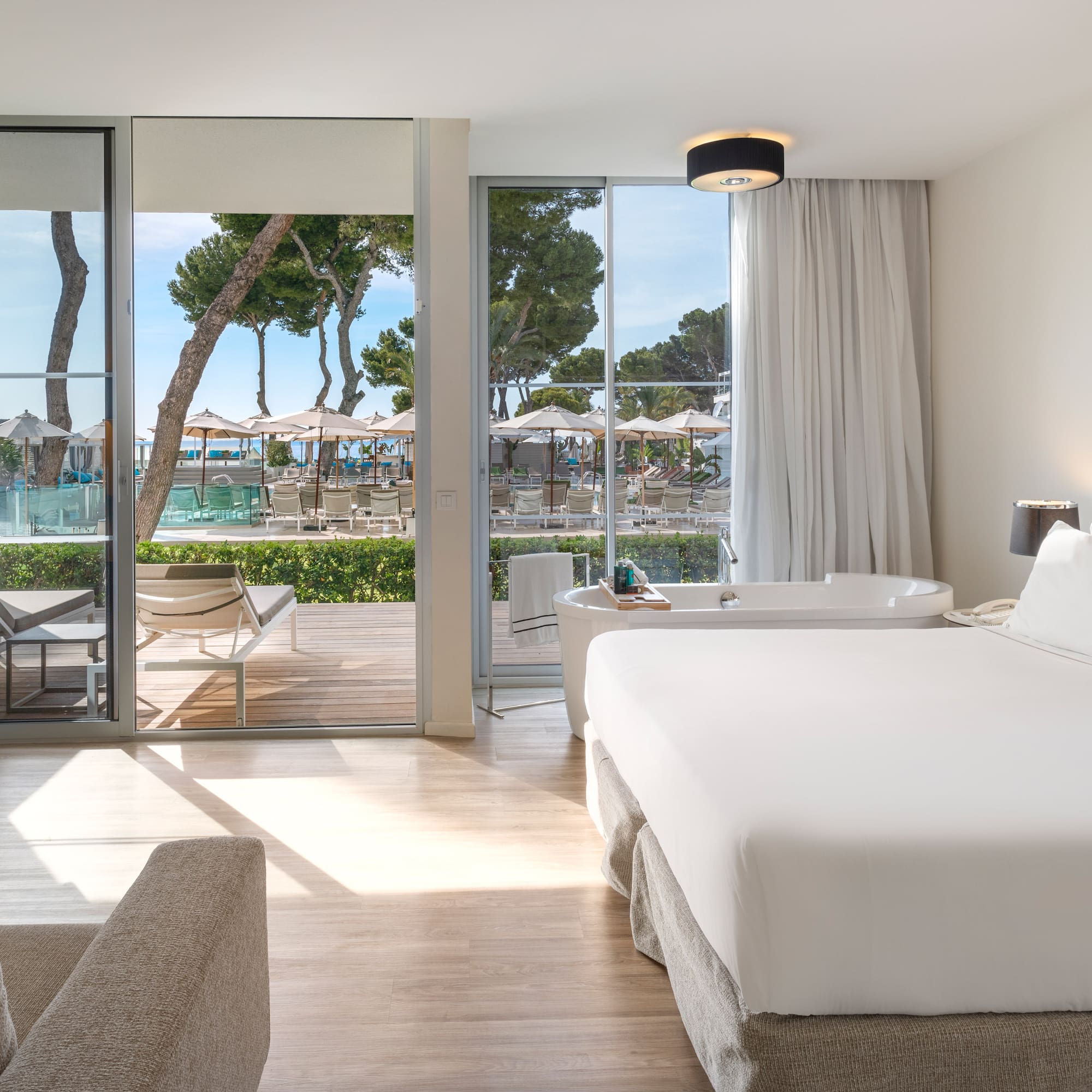 a room with a bed and a tub