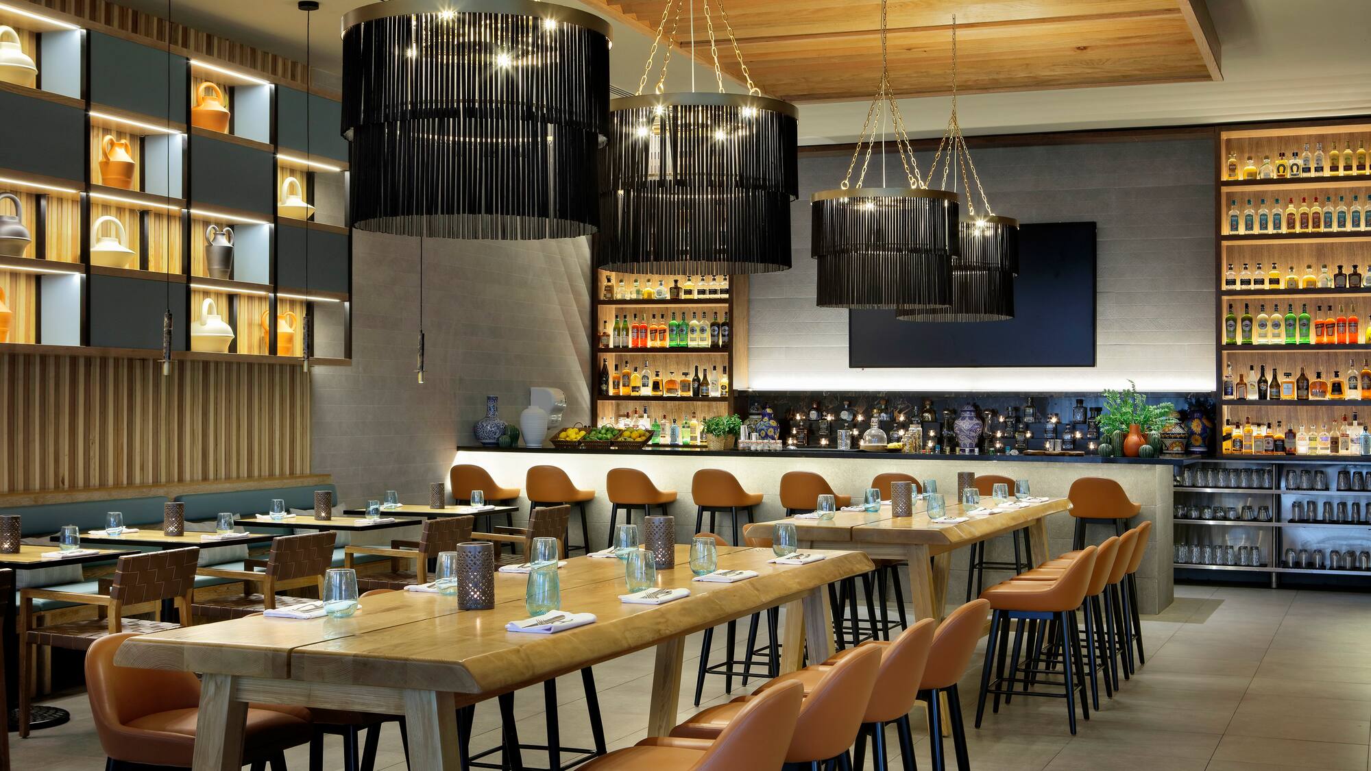 a restaurant with tables and chairs