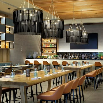 a restaurant with tables and chairs