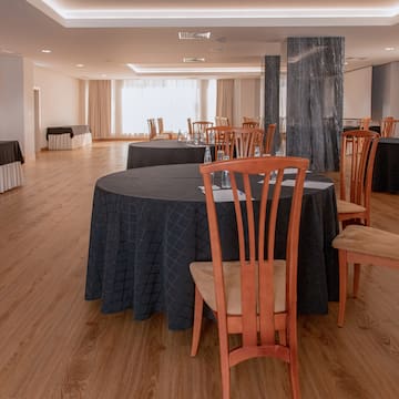 a room with tables and chairs