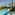 Long resort swimming pool, modern hotel with balconies, and lush palm trees.