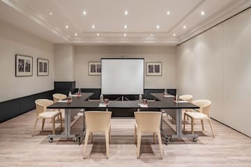 a room with a table and chairs
