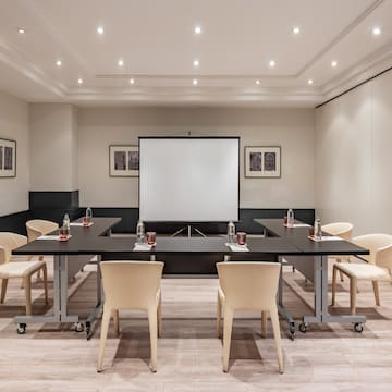 a room with a table and chairs