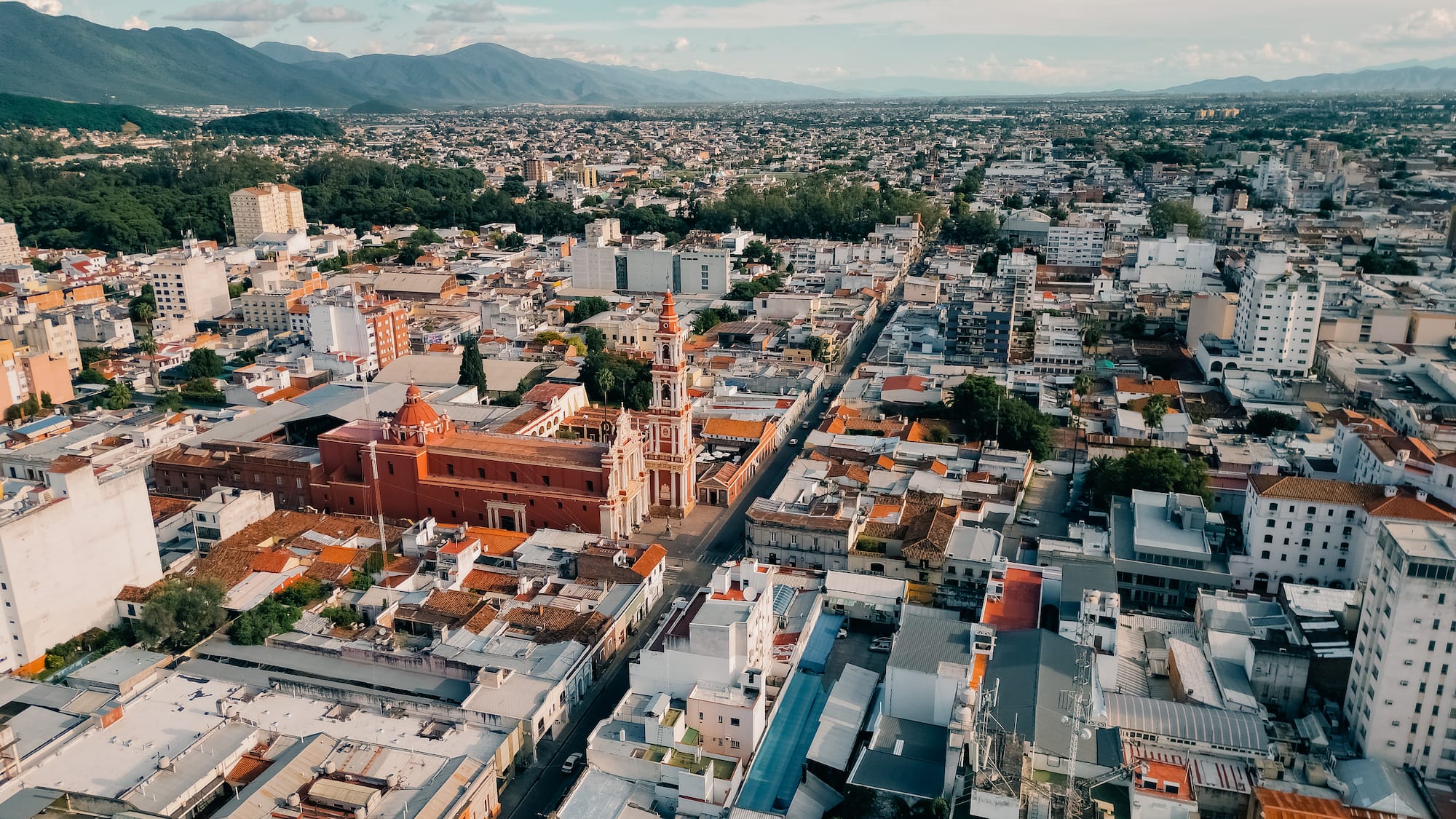 a city with many buildings and trees