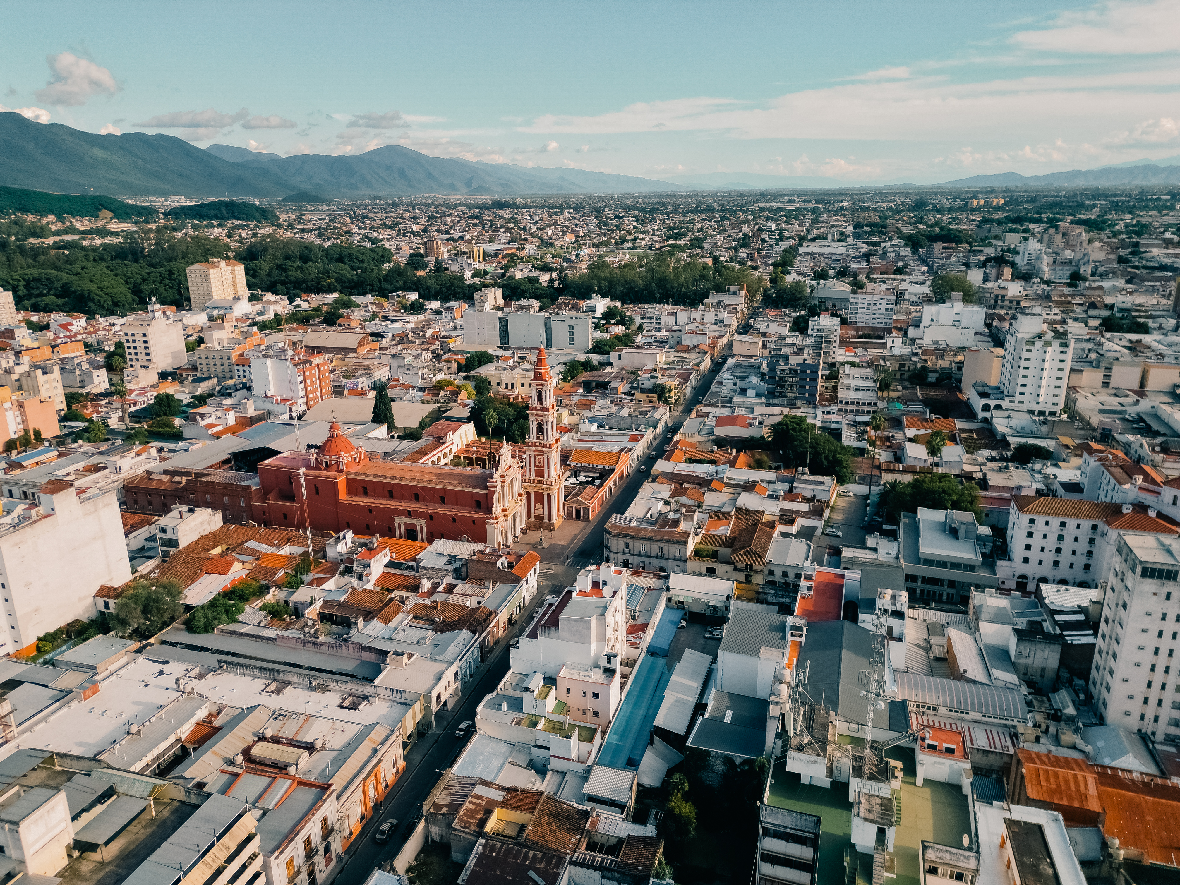 a city with many buildings and trees