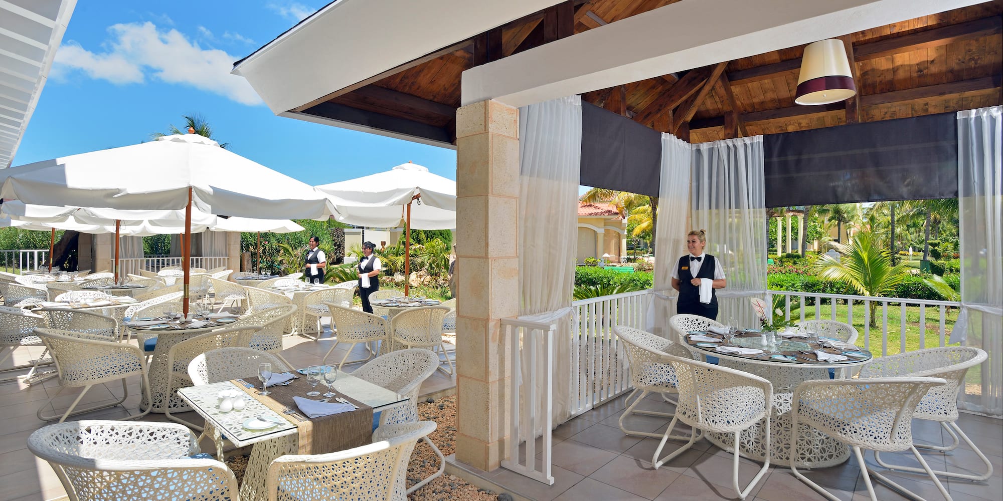 a restaurant with tables and chairs