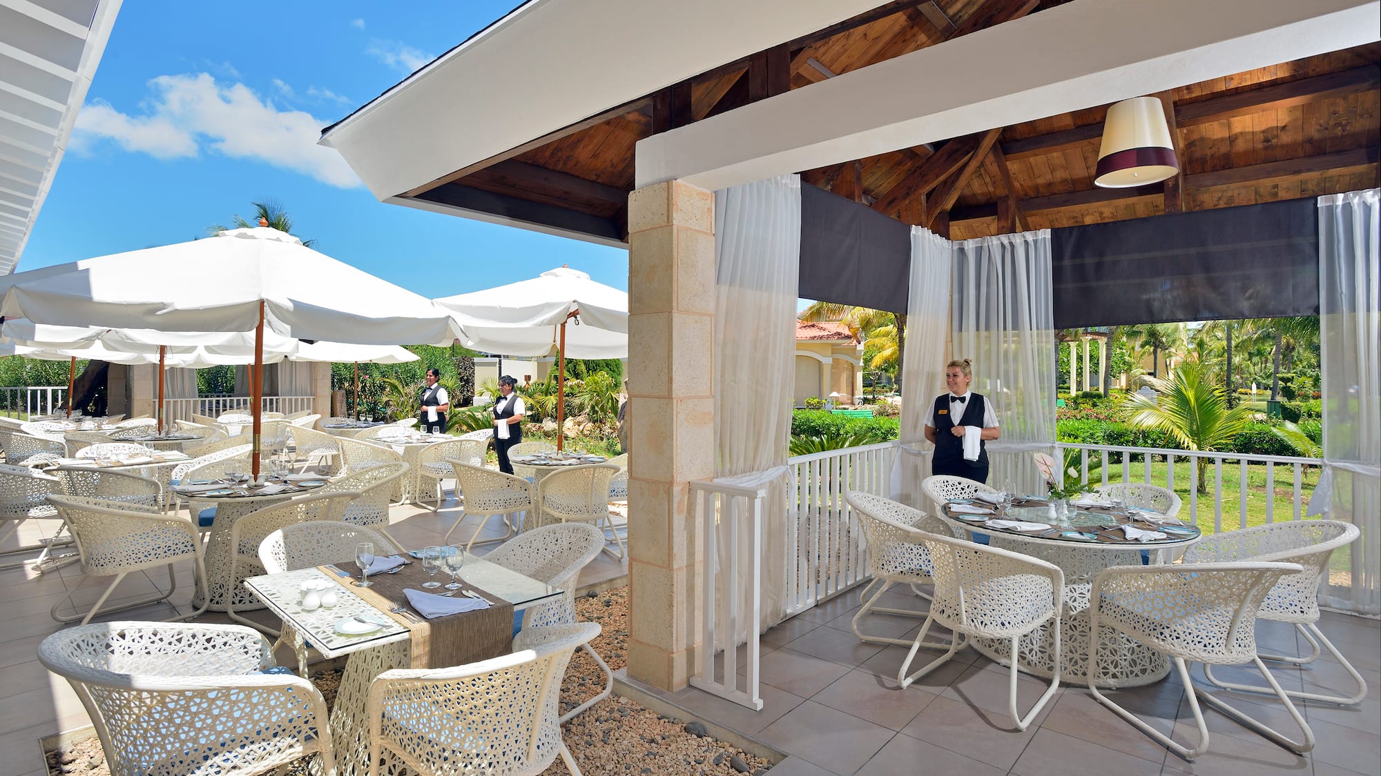 a restaurant with tables and chairs