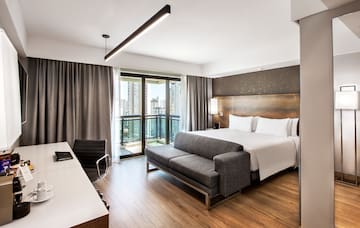 a room with a bed and a desk