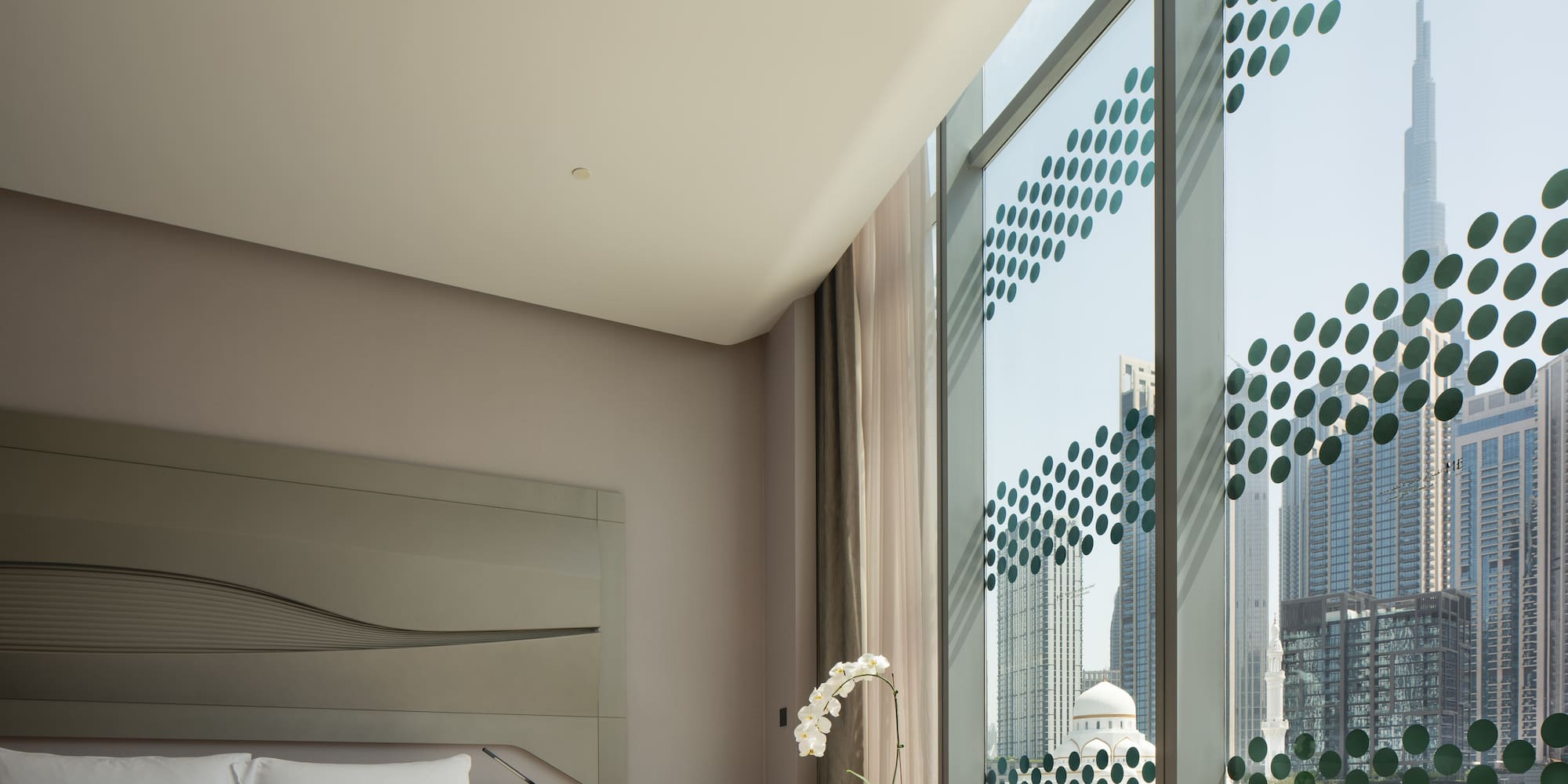 a room with a bed and a chair