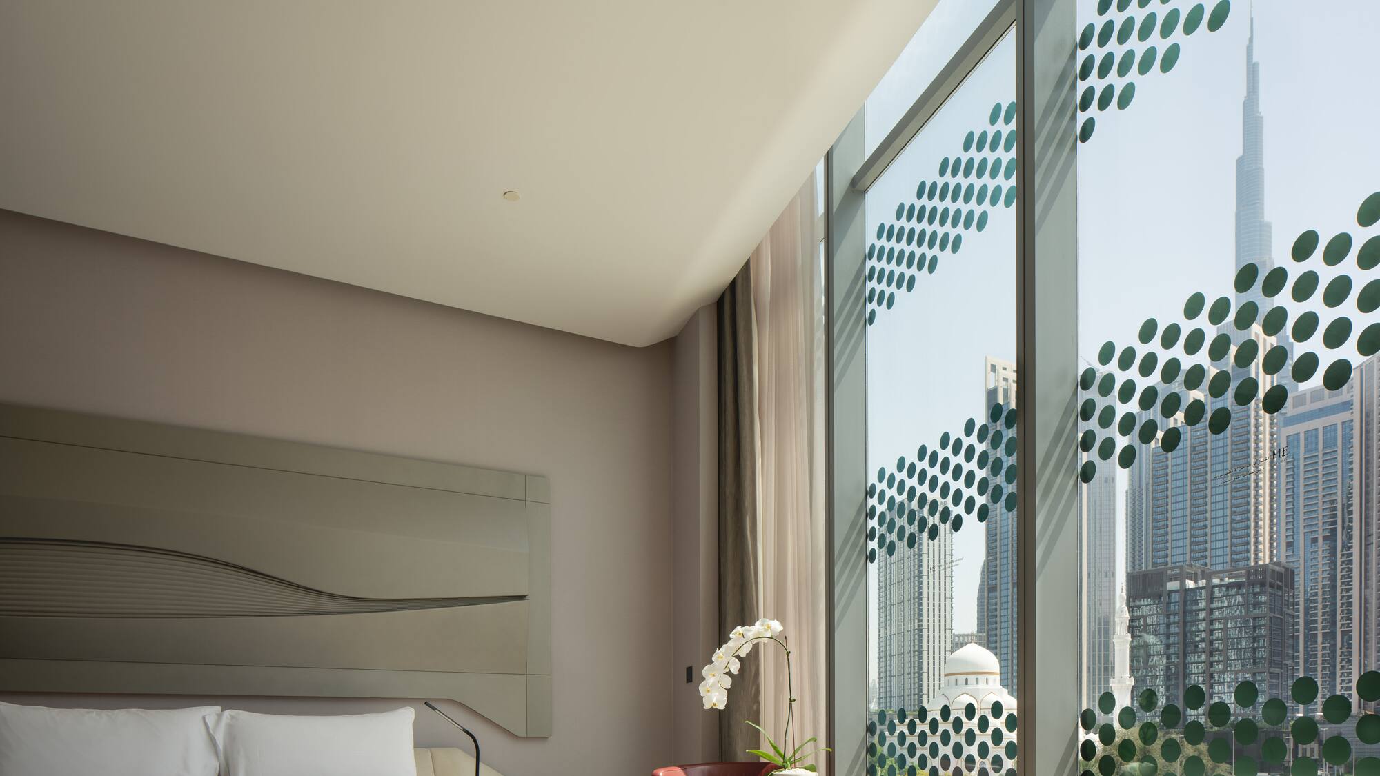 a room with a bed and a chair