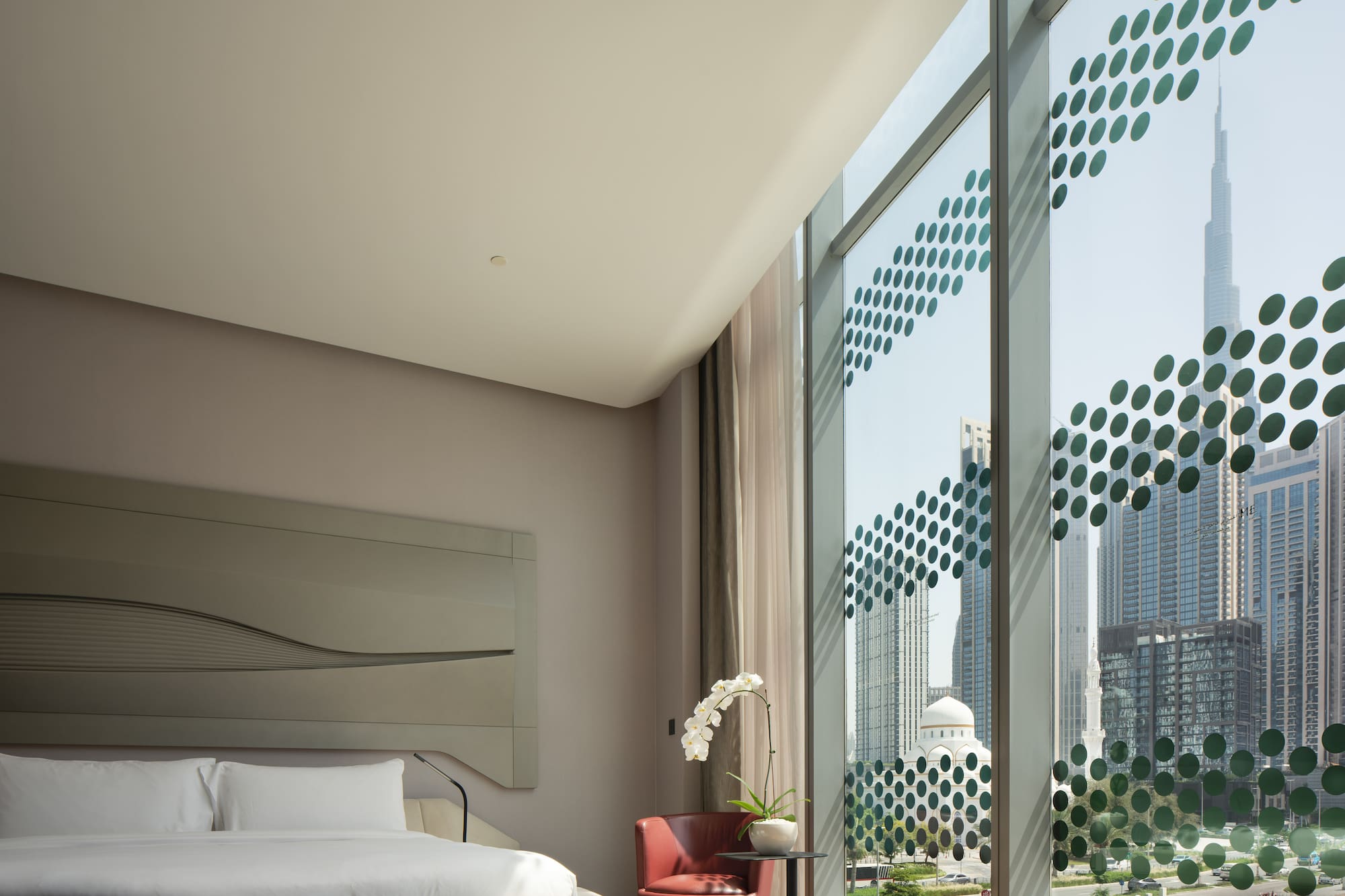 a room with a bed and a chair