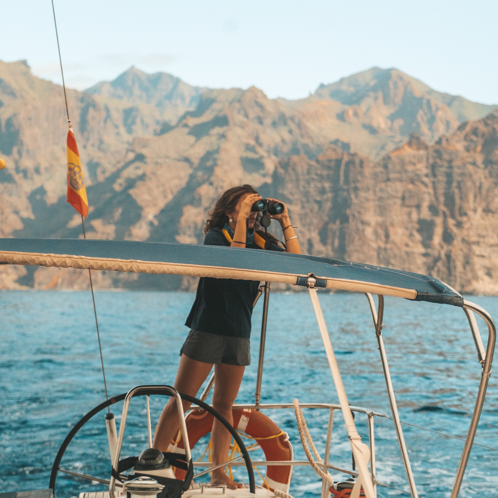 a woman on a boat with a camera