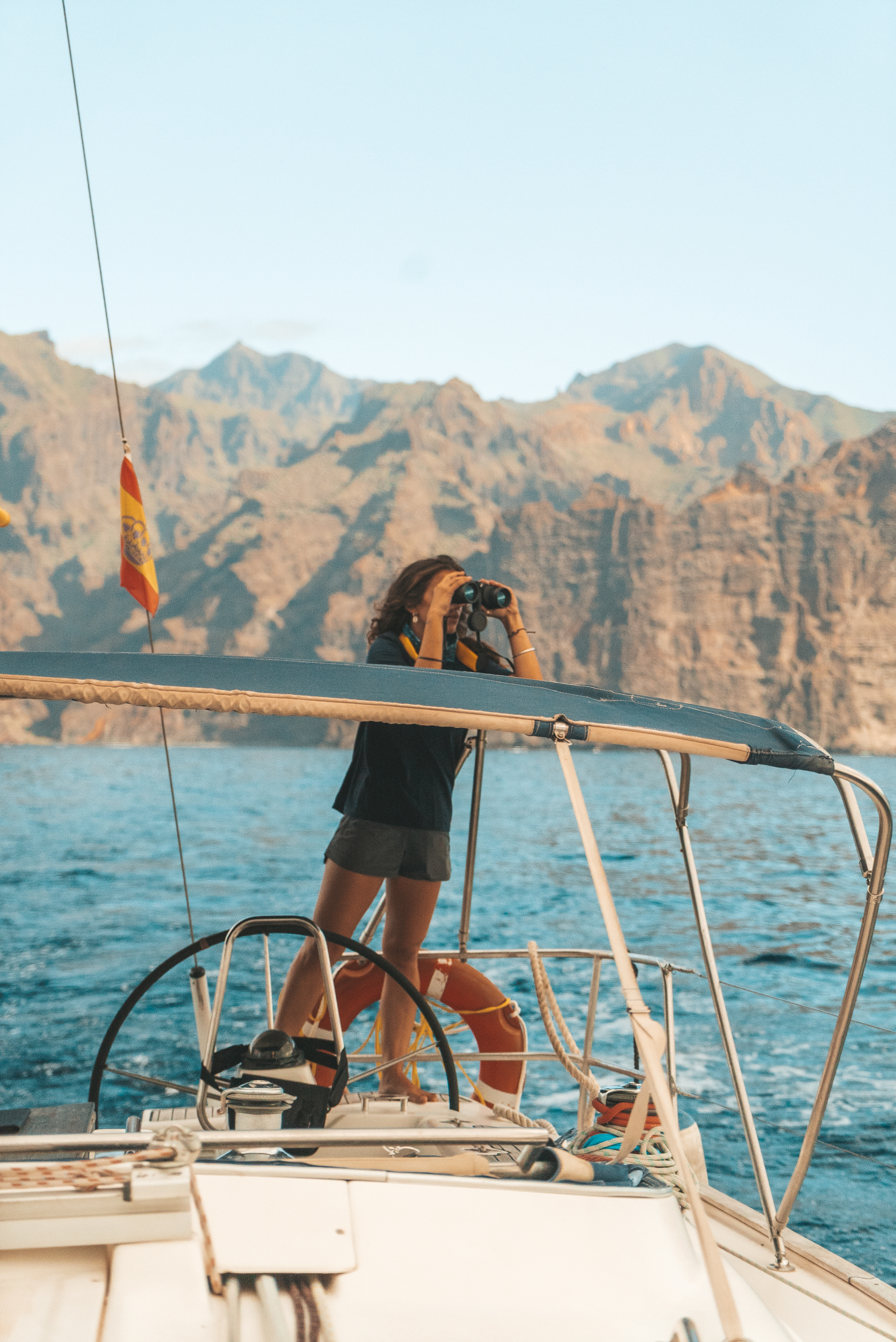 a woman on a boat with a camera