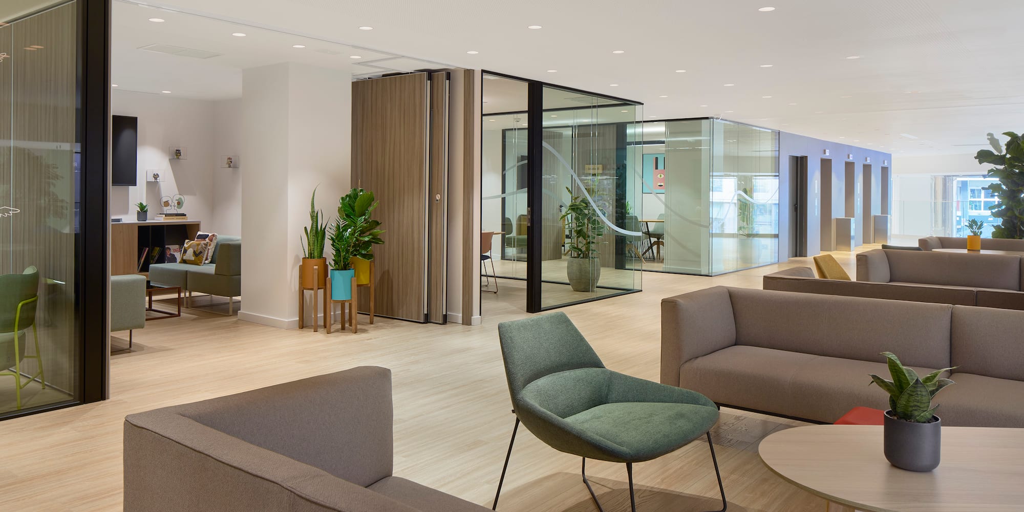 a room with couches and chairs